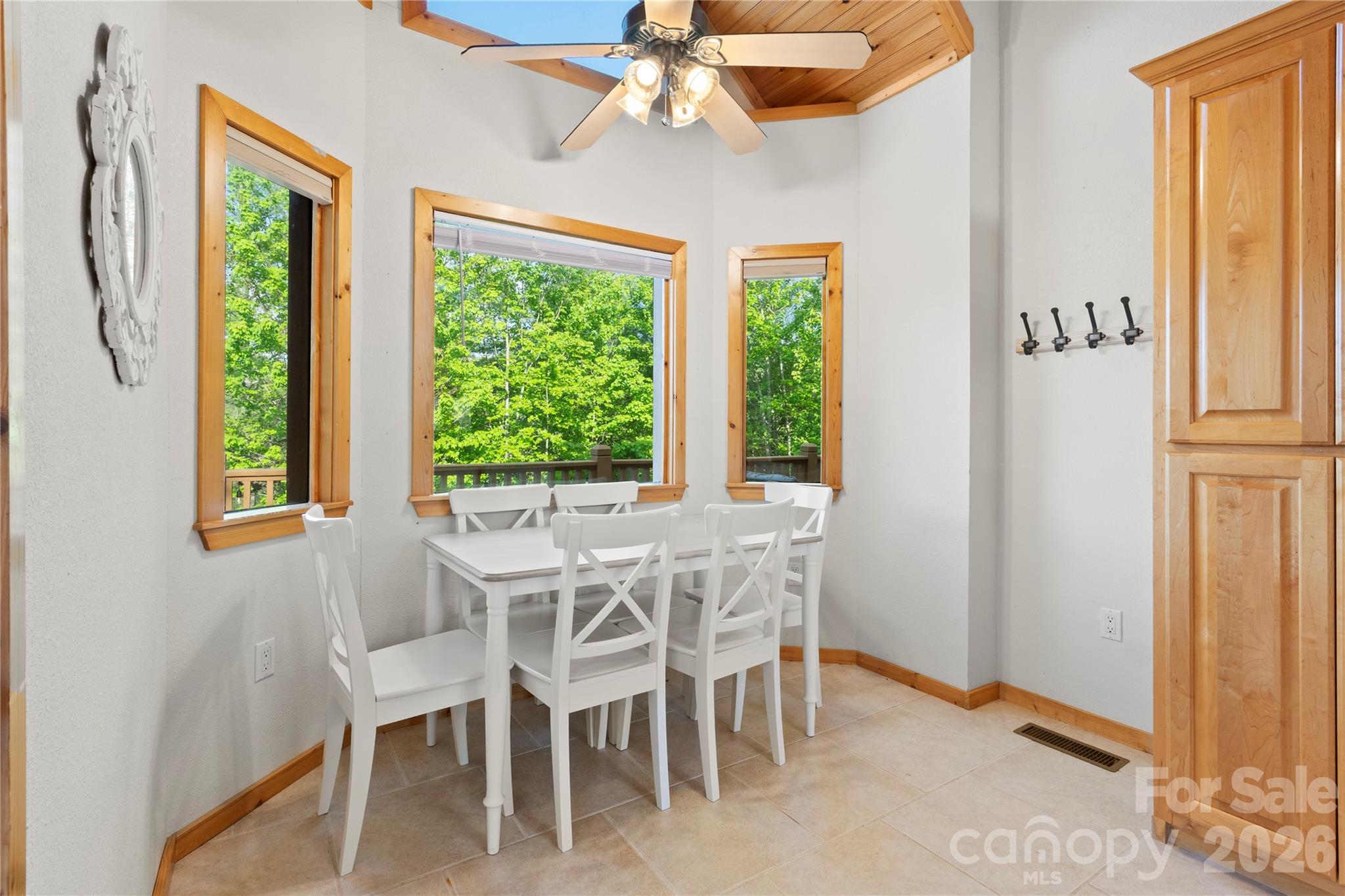 273 North Rhododendron Road Almond, NC 28702 - Photo 10 of 27 a dining room with furniture and window