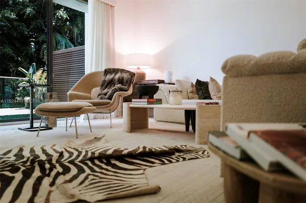 a workspace with furniture and window