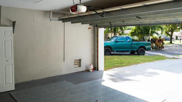 a view of a backyard of the house