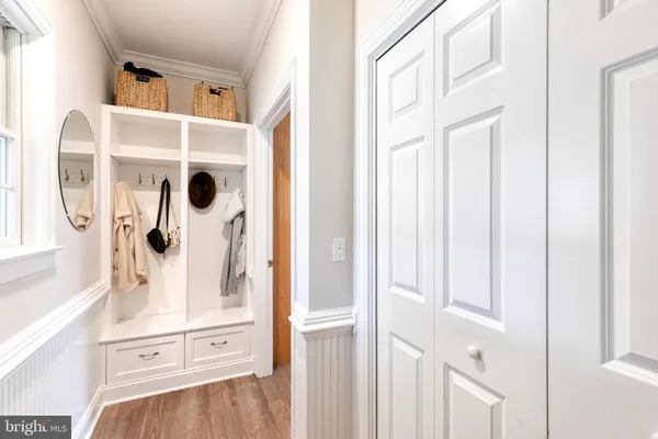 a close view of a utility room with dryer and washer