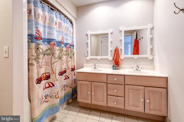 a bathroom with a sink a vanity and a mirror