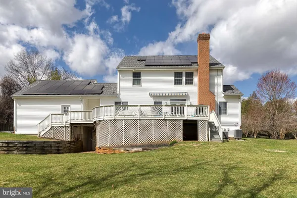 a view of a house with a big yard