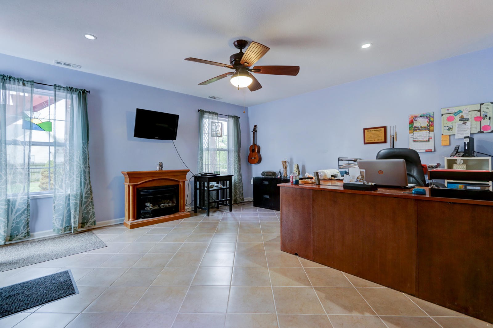 447 Pecan Circle Corryton, TN 37721 - Photo 20 of 28 a living room with furniture and a fireplace