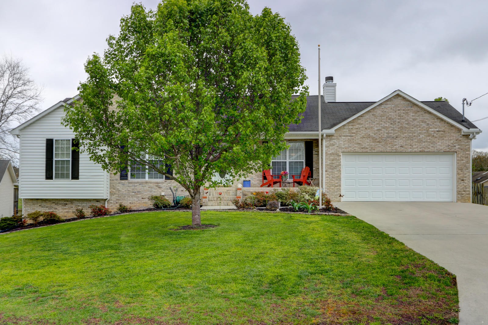 447 Pecan Circle Corryton, TN 37721 - Photo 2 of 28 a front view of house with yard and green space