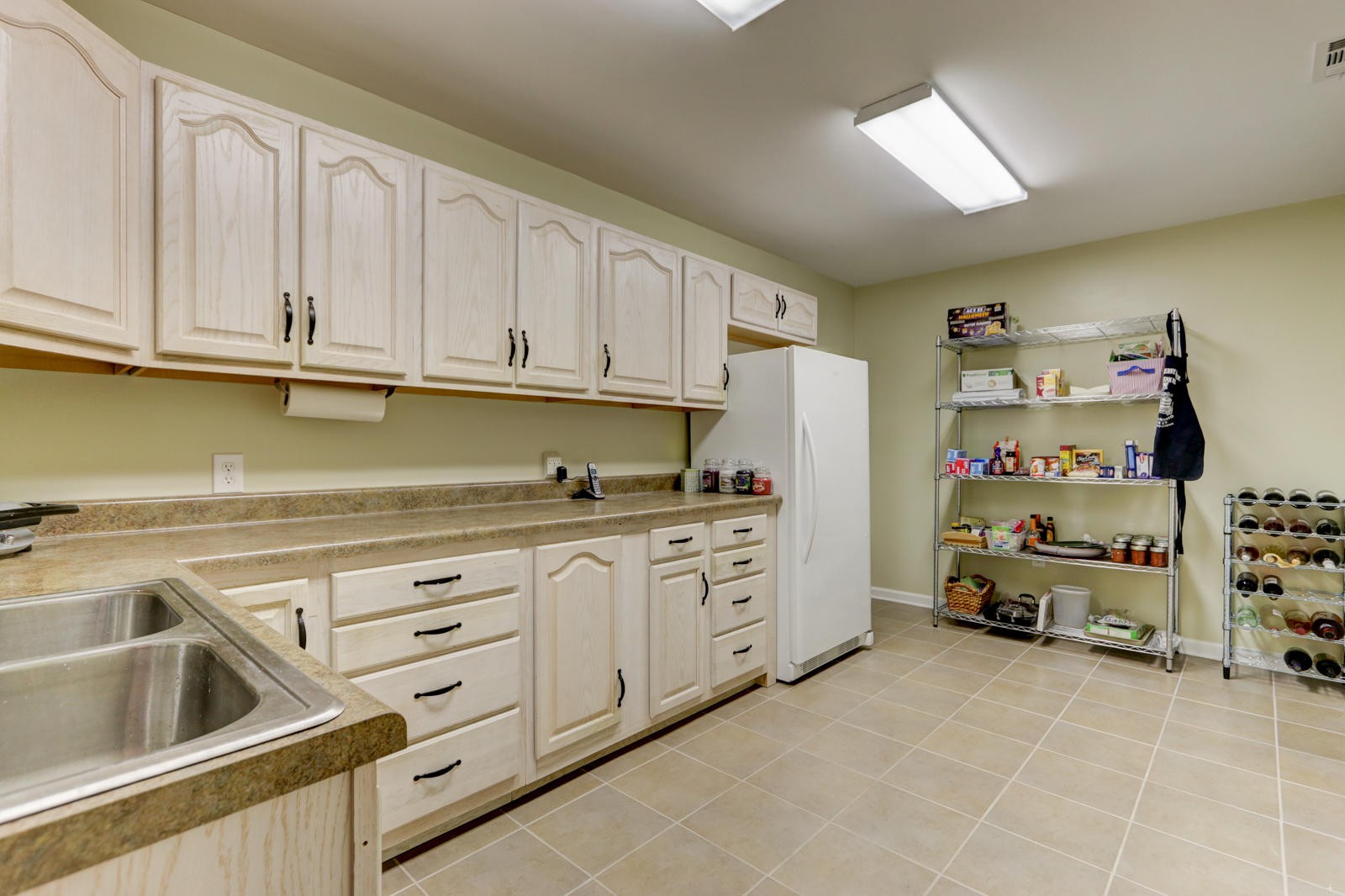 447 Pecan Circle Corryton, TN 37721 - Photo 23 of 28 a kitchen with cabinets and window
