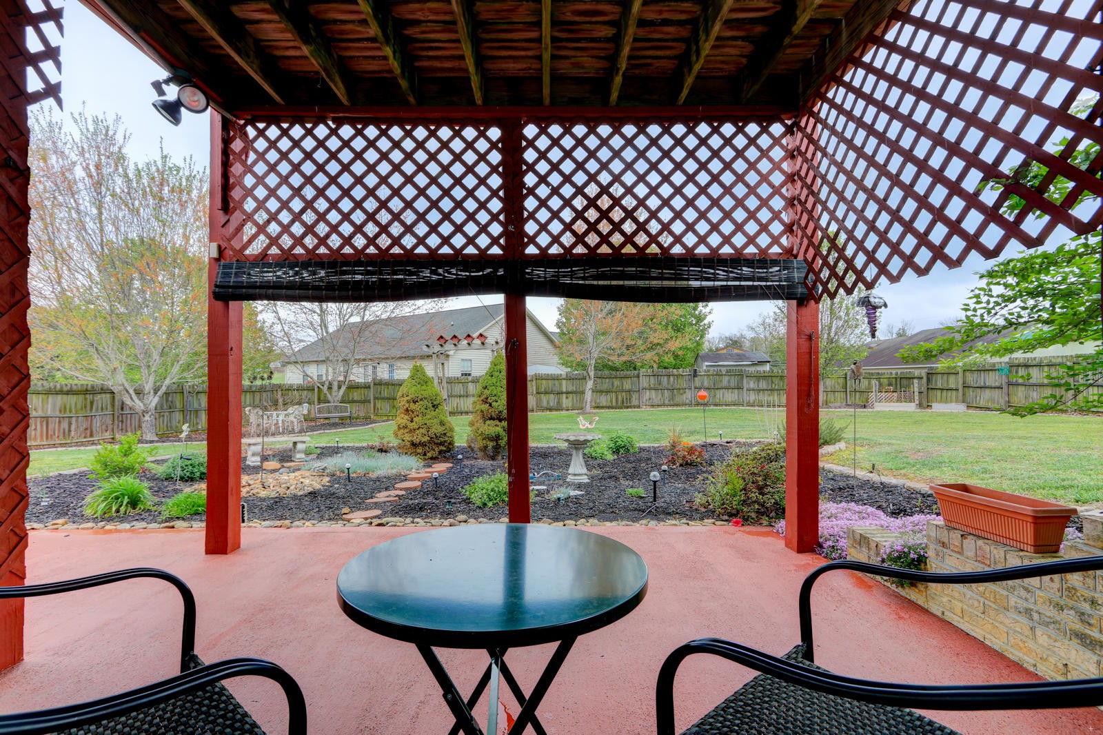 447 Pecan Circle Corryton, TN 37721 - Photo 27 of 28 a backyard of a house with outdoor seating