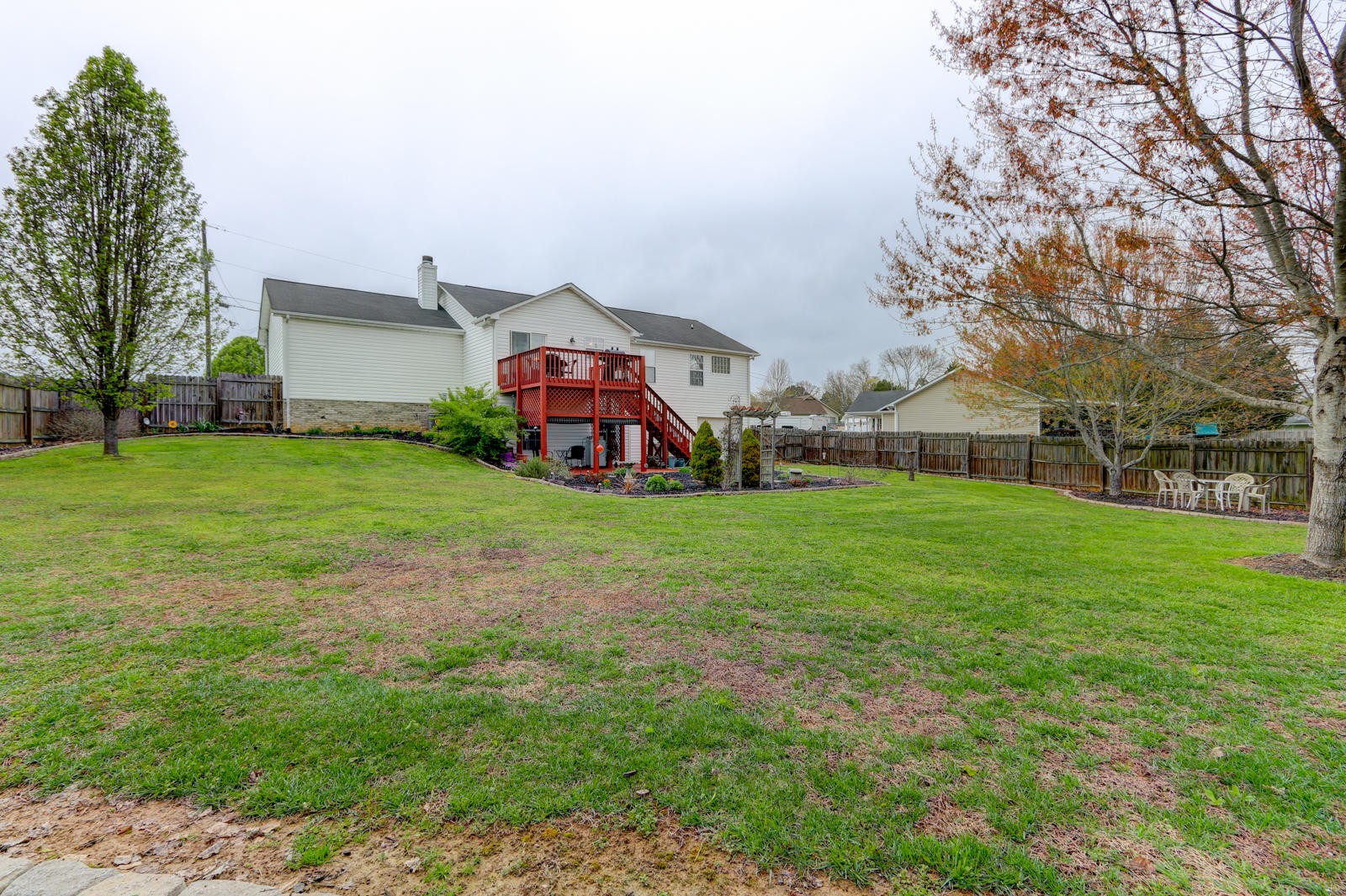 447 Pecan Circle Corryton, TN 37721 - Photo 28 of 28 a view of a house with a back yard
