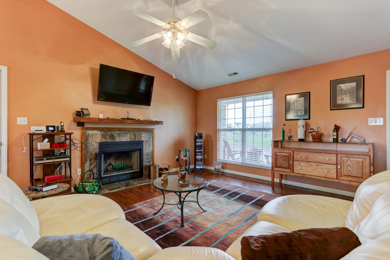 447 Pecan Circle Corryton, TN 37721 - Photo 5 of 28 a living room with furniture fireplace and flat screen tv