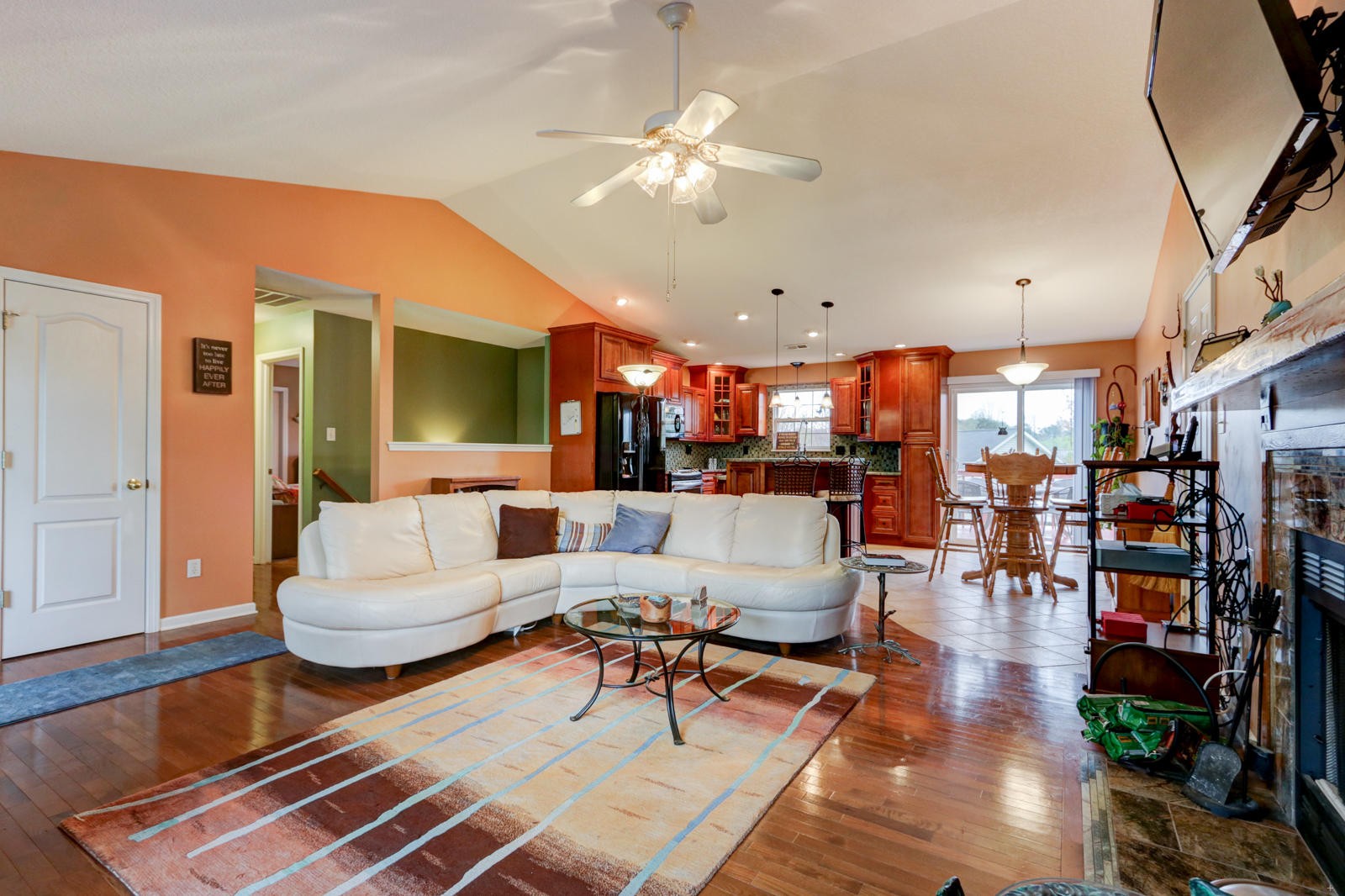 447 Pecan Circle Corryton, TN 37721 - Photo 6 of 28 a living room with lots of furniture kitchen view and a chandelier