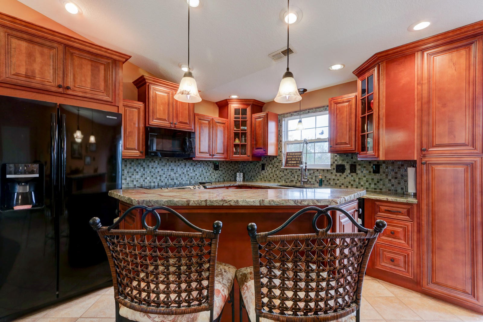 447 Pecan Circle Corryton, TN 37721 - Photo 10 of 28 a kitchen that has a lot of cabinets a sink and a dishwasher with wooden floor