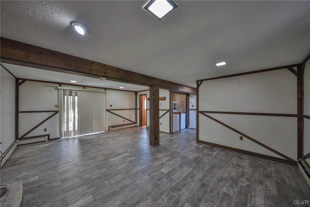 1288 Seifert Road Nazareth, PA 18064 - Photo 23 of 50 a view of an empty room with wooden floor and a window
