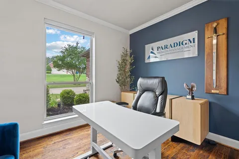 a view of table and chair in room