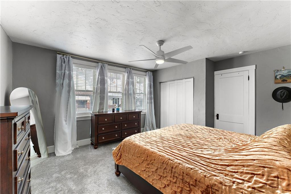 4101 Franklin Road Pittsburgh, PA 15214 - Photo 23 of 38 a bedroom with a bed and a dresser