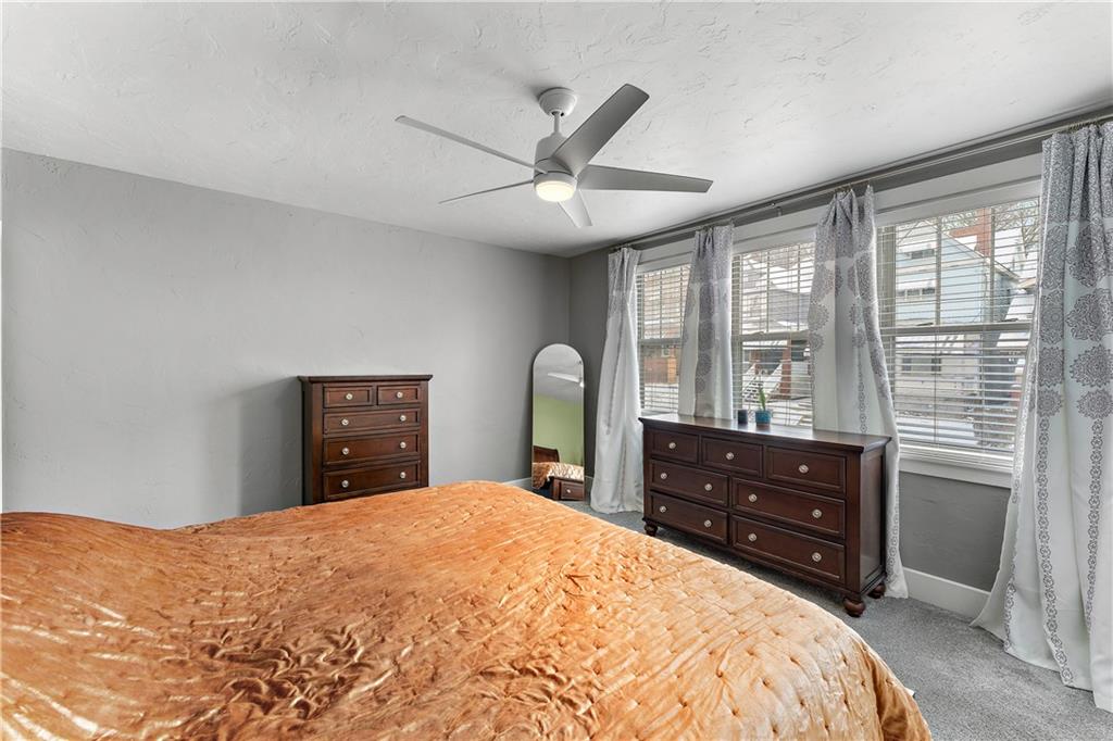 4101 Franklin Road Pittsburgh, PA 15214 - Photo 24 of 38 a bedroom with a bed and a dresser