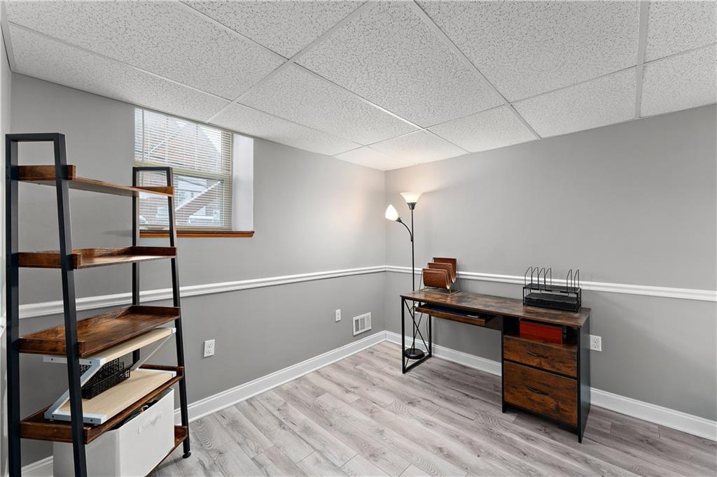 4101 Franklin Road Pittsburgh, PA 15214 - Photo 34 of 38 a view of a workspace with furniture and wooden floor