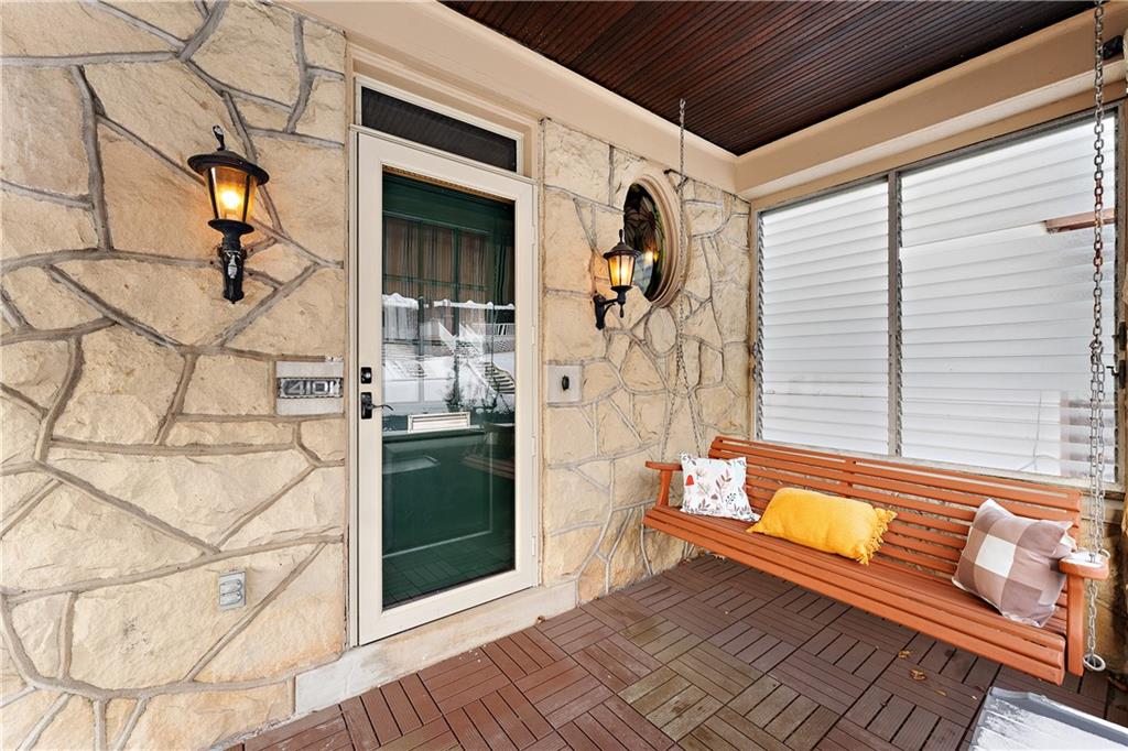 4101 Franklin Road Pittsburgh, PA 15214 - Photo 4 of 38 a view of a porch with wooden floor and furniture