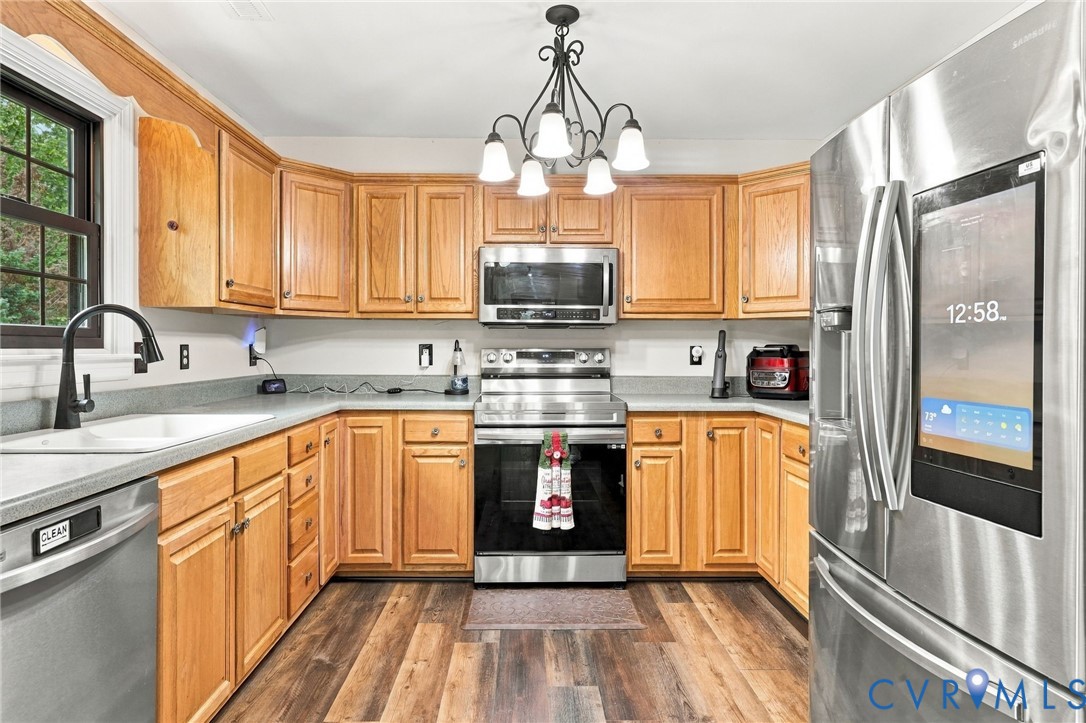 133 Ford Road Bumpass, VA 23024 - Photo 14 of 55 Kitchen featuring wood cabinetry, stainless steel