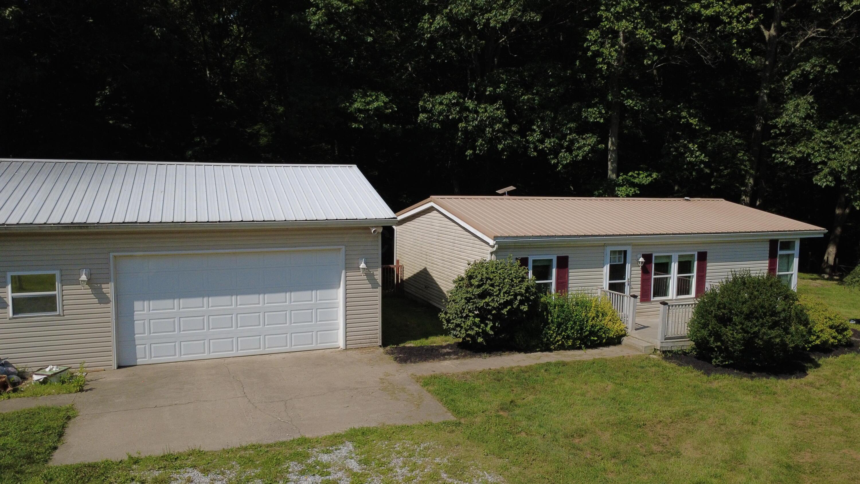 13338 Middlefork Road Rockbridge, OH 43149 - Photo 1 of 22 dji_fly_20260703_163834_180_178311116121