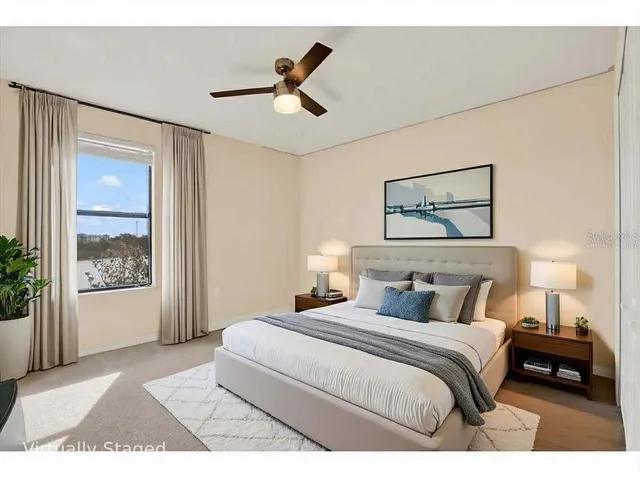 a front view of a house with swimming pool and porch