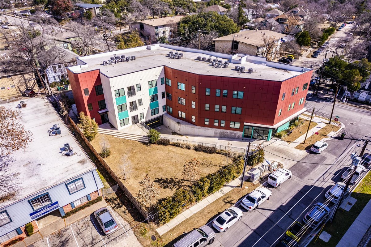 3000 Duval Street, Unit 302 Austin, TX 78705 - Photo 25 of 28 an aerial view of a house with large trees