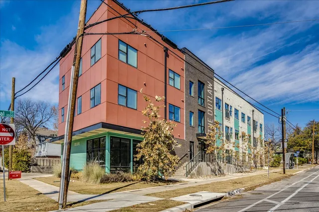 a view of a building with sitting area