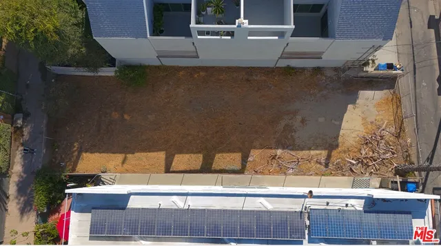 a view of roof deck with patio