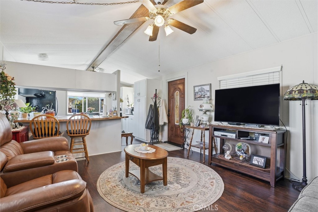 500 Atascadero Road, Unit D8 Morro Bay, CA 93442 - Photo 8 of 26 a living room with furniture and a flat screen tv