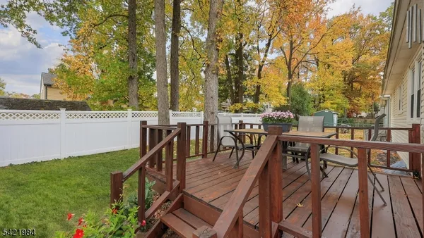 a view of a chairs and table on the terrace