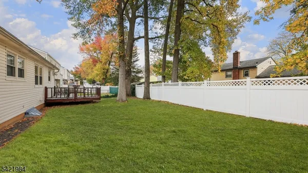a view of back yard of the house