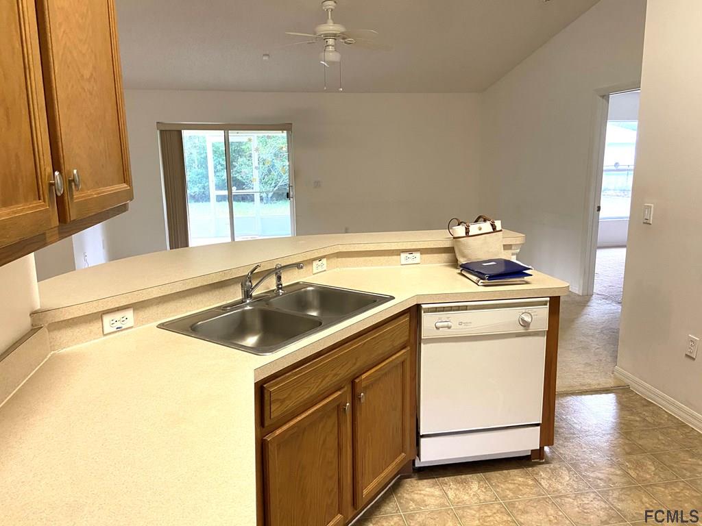 62 Rae Drive Palm Coast, FL 32164 - Photo 11 of 24 Kitchen View to Family Room