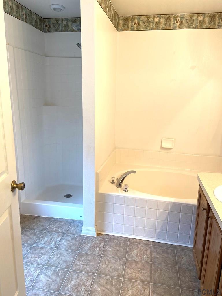62 Rae Drive Palm Coast, FL 32164 - Photo 18 of 24 Master Bath, Tub and Shower