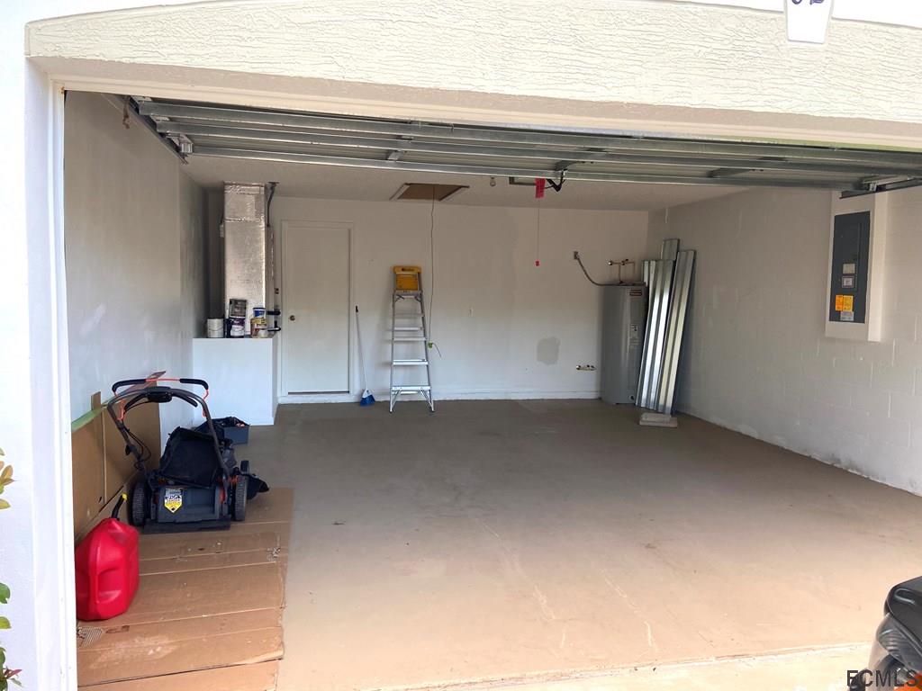 62 Rae Drive Palm Coast, FL 32164 - Photo 23 of 24 Garage
