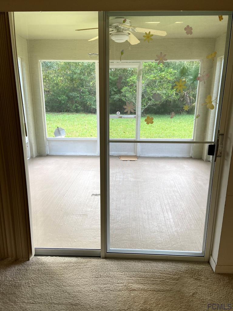 62 Rae Drive Palm Coast, FL 32164 - Photo 8 of 24 Sliding Glass doors to Patio