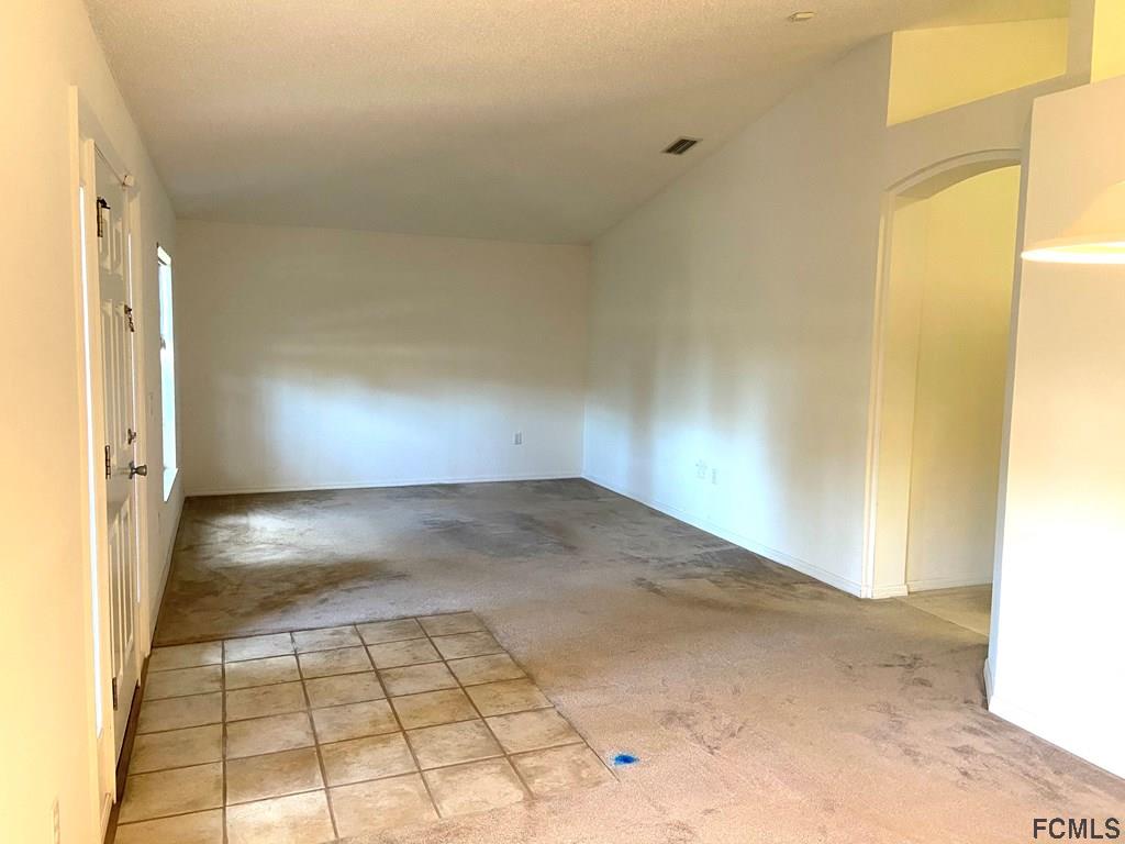 62 Rae Drive Palm Coast, FL 32164 - Photo 10 of 24 Front Entrance -Living Room
