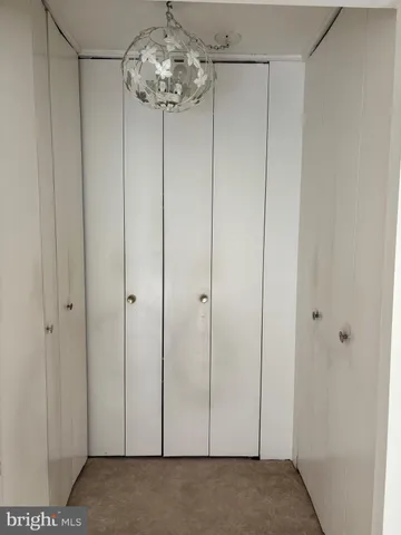 a view of an empty room with a balcony