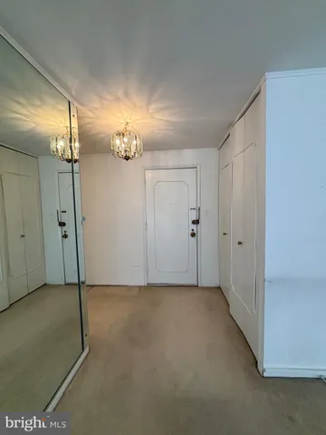 a view of a room with a chandelier