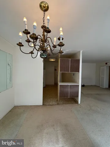 a kitchen with stainless steel appliances wooden cabinets and a sink