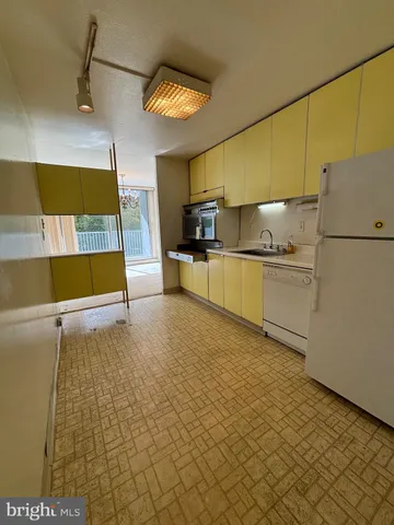 a view of lobby with a floor to ceiling window and stairs