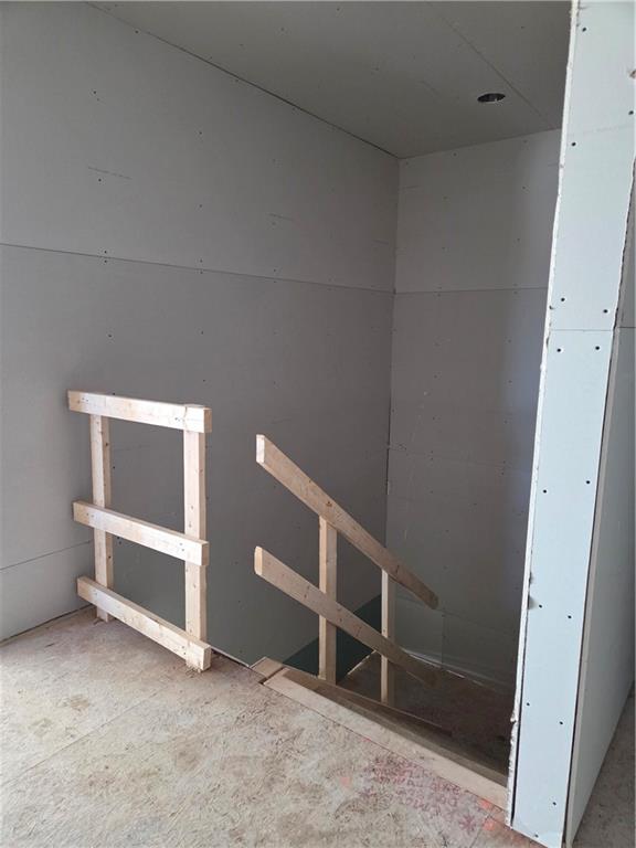 695 Ridge Avenue Canonsburg, PA 15317 - Photo 8 of 12 a view of an empty room with stairs and a window