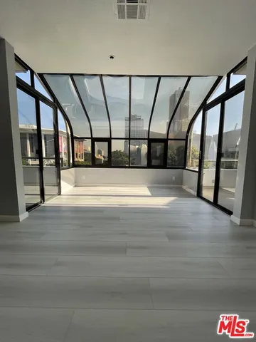a view of staircase with large window