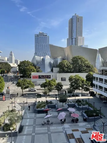 a view of building with yard