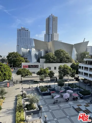 a front view of a building with lots of car windows