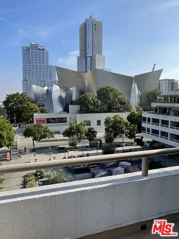 an aerial view of a house with outdoor space