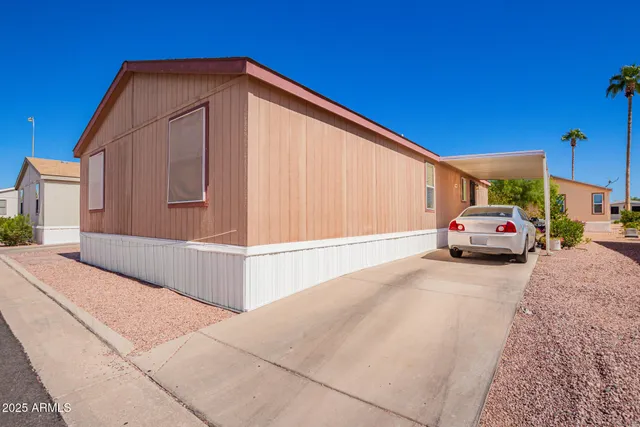 a front view of a house with parking