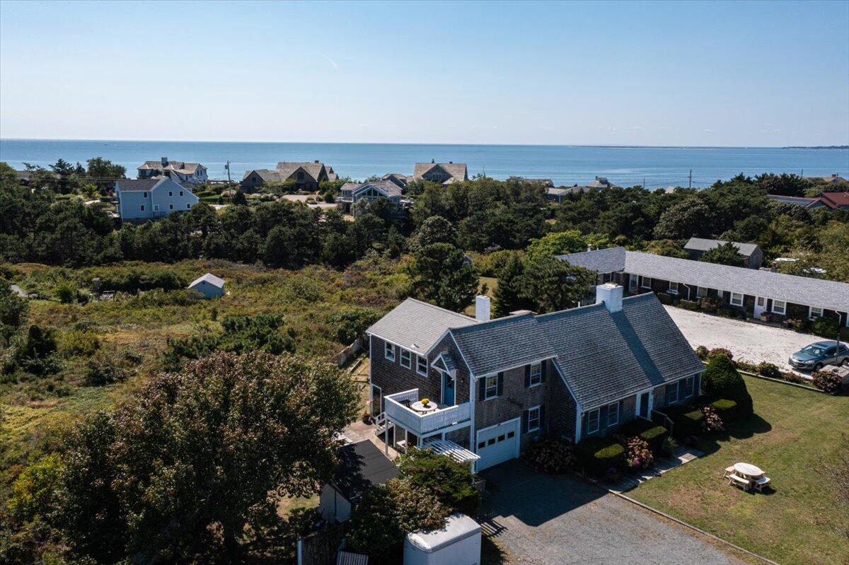 146 Shore Road Truro, MA 02666 - Photo 50 of 62 an aerial view of a house with a garden