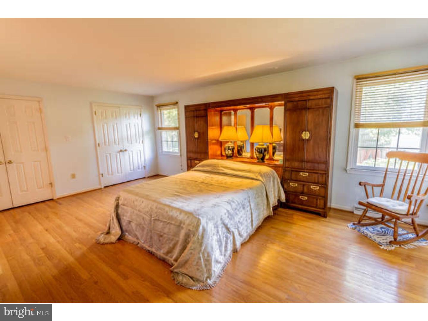 725 Burnley Road Wilmington, DE 19803 - Photo 16 of 23 a spacious bedroom with a bed and a large window