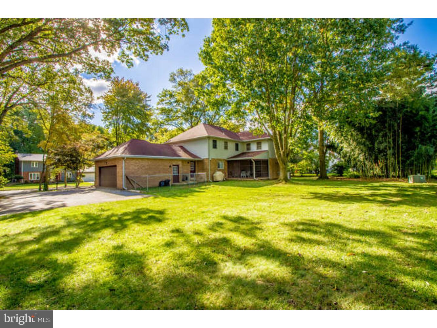 725 Burnley Road Wilmington, DE 19803 - Photo 3 of 23 a front view of a house with a garden