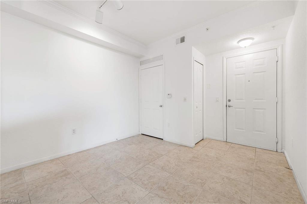 12980 Positano Circle, Unit 308 Naples, FL 34105 - Photo 18 of 22 a view of an empty room