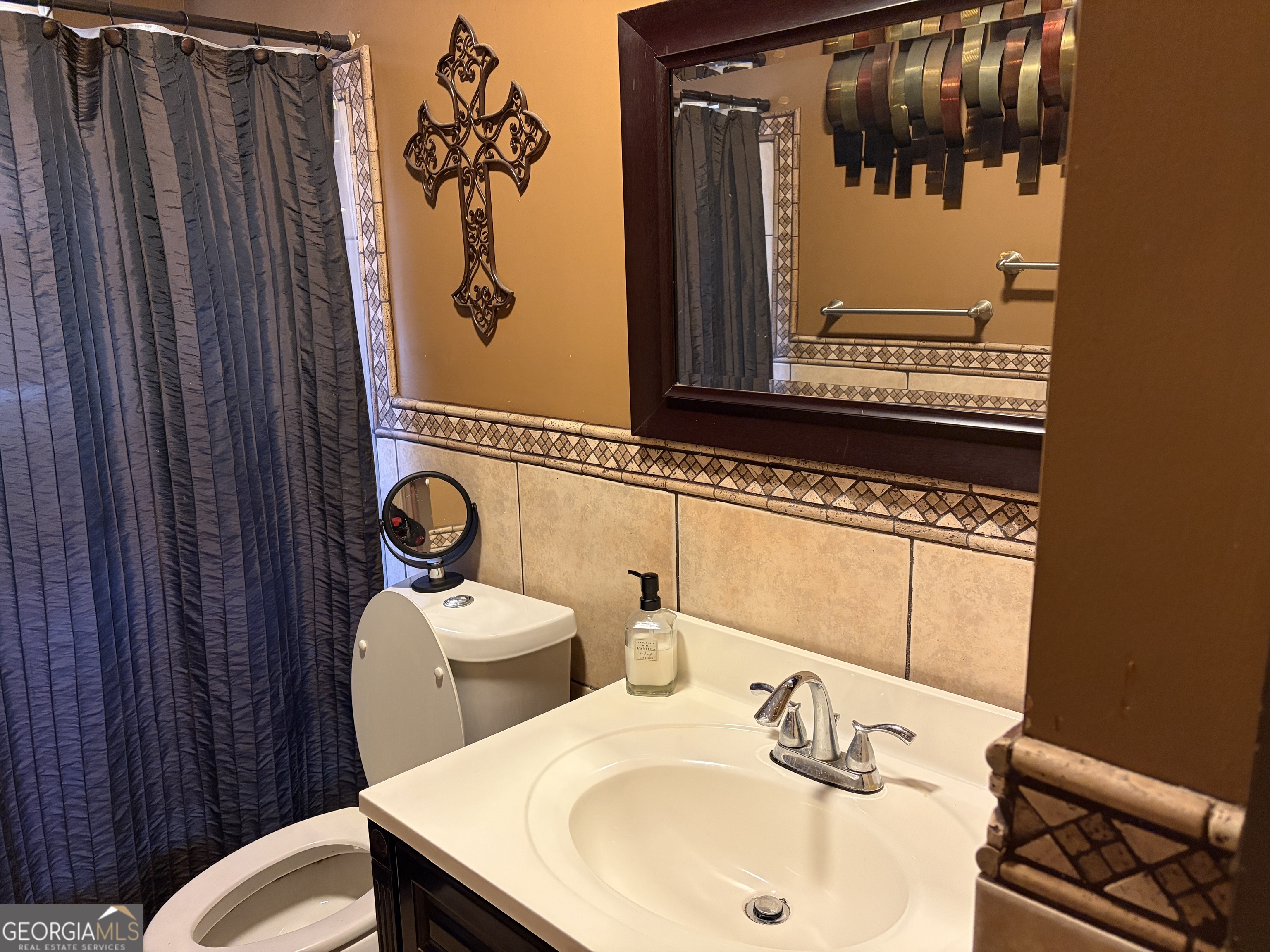 1216 North Bellview Road Aragon, GA 30104 - Photo 8 of 19 a bathroom with a sink and a mirror