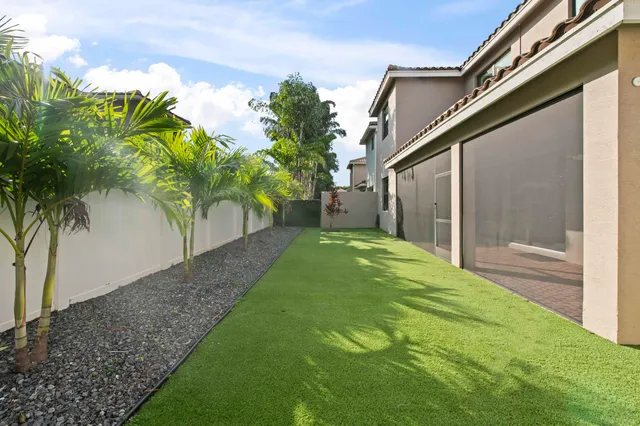 a view of a back yard of the house